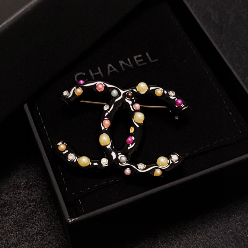 Ch**el brooches